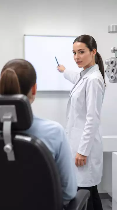 Optometrist performing a visual acuity test