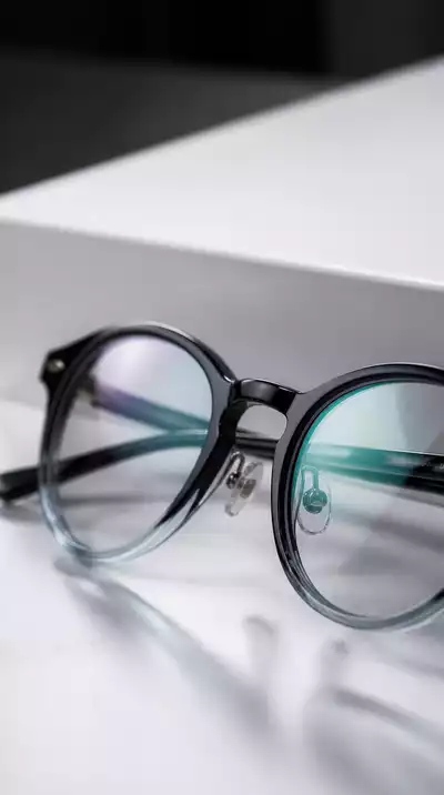 Close-up of stylish eyeglasses on a clean surface